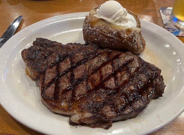 16-ounce ribeye on a white plate at Texas Roadhouse