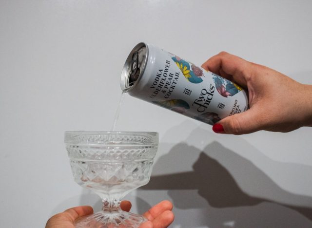 can of Two Chicks cocktail and a glass