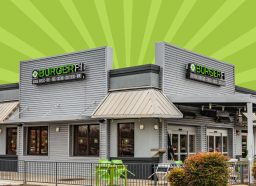 burgerfi restaurant on a designed green background