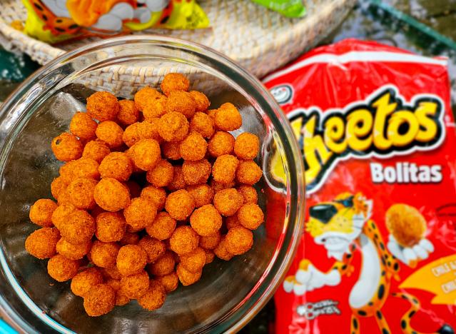 a bowl of cheetos bolitas.