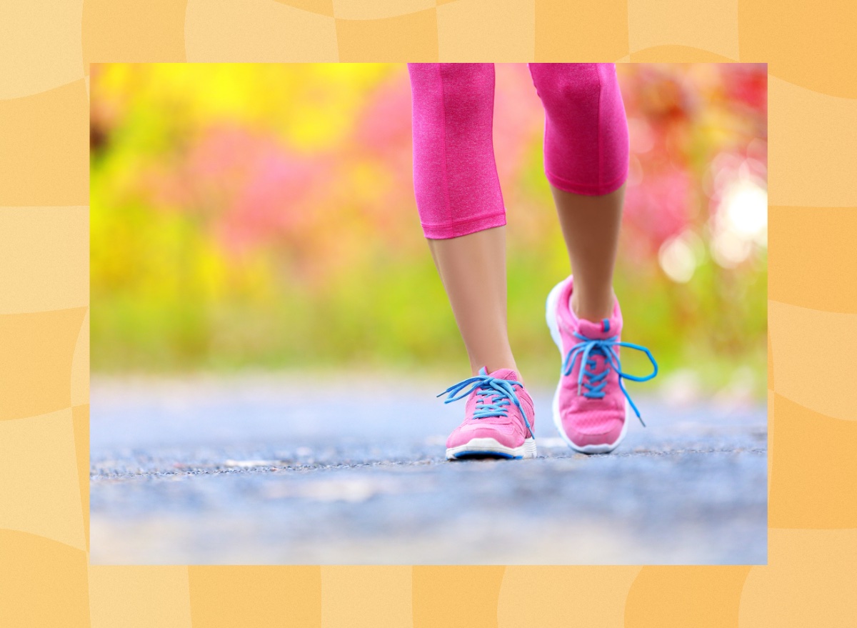 close-up of woman's feet in pink sneakers walking outdoors