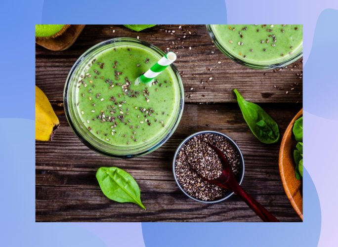 green smoothie with spinach and banana on wood table