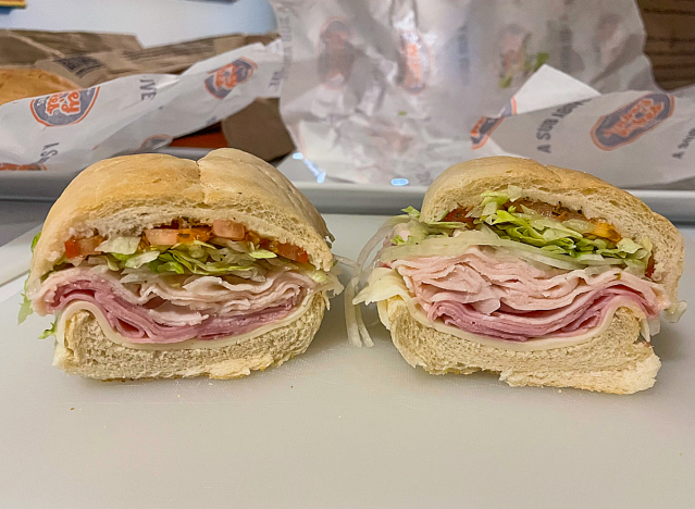 a jersey mike club sub cut in half on a wrapper.