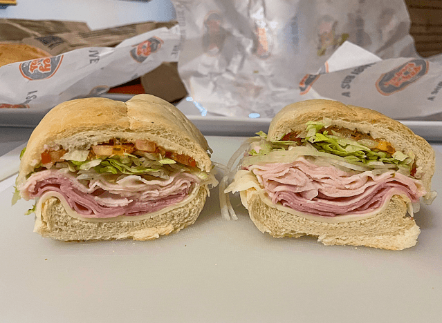 a jersey mike club sub cut in half on a wrapper.