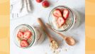 overnight oats with strawberries in two mason jars