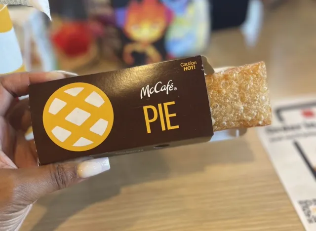 person holding mcdonald's fried apple pie