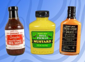 trader joe's organic sriracha and roasted bbq sauce, dill pickle mustard, and peri-peri sauce on designed blue background