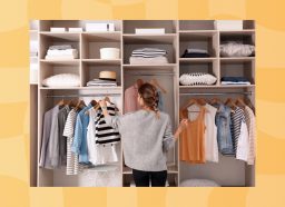 woman organizing her large closet