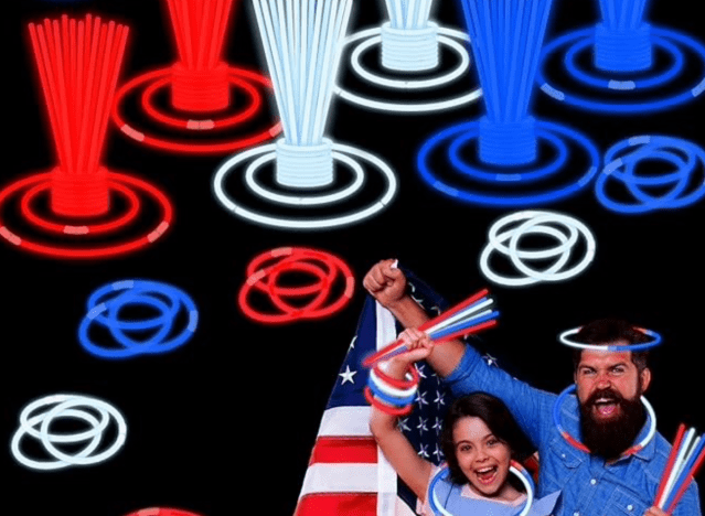4th of july glowsticks with man and child wearing them