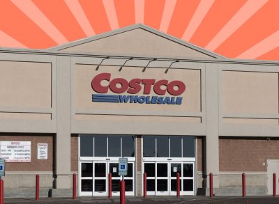 Costco storefront on striped red background