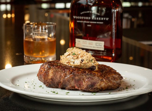 Woodford Reserve Dry-Aged Ribeye with roasted garlic butter and a Wagyu fat-Infused Woodford Reserve double-oaked Old Fashioned cocktail at Ocean Prime