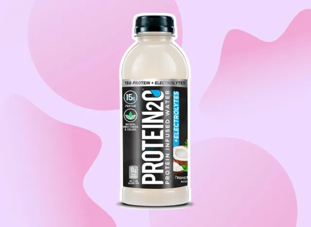 bottle of Protein20 water on a pink background