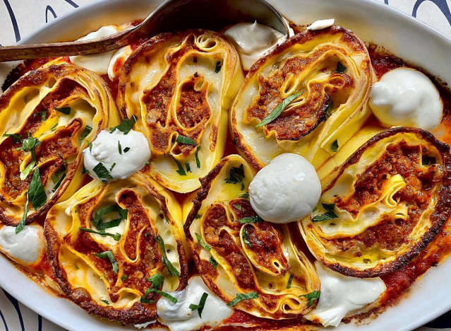a plate of don angie's famous pinwheel lasagna