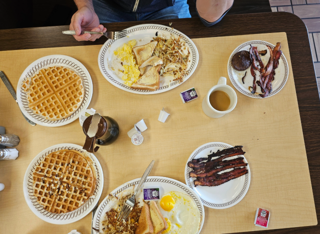 people eating at waffle house