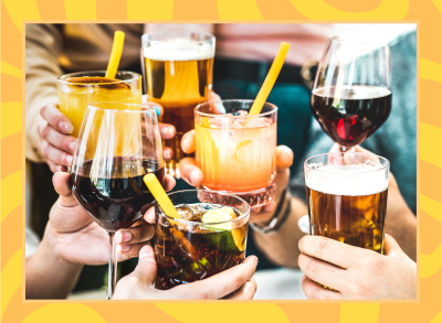 group of people cheers with alcoholic drinks like wine cocktails and beer