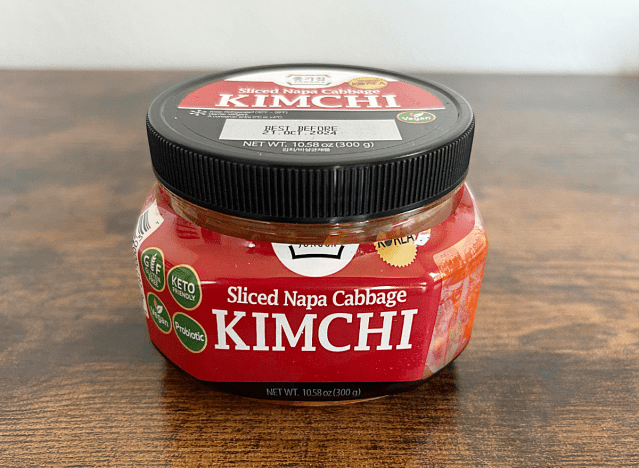 a jar of jongga kimchi on a table 