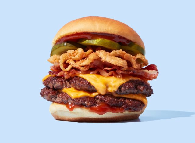 shake shack's smoky classic bbq burger on a light blue background