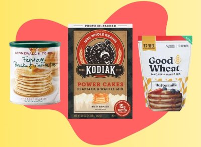 A trio of pancake and waffle mixes set against a colorful background