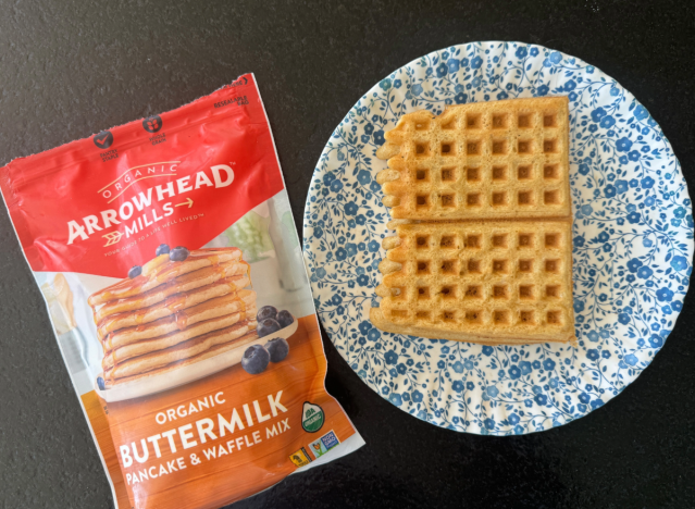arrowhead mills mix next to a waffle on a plate 