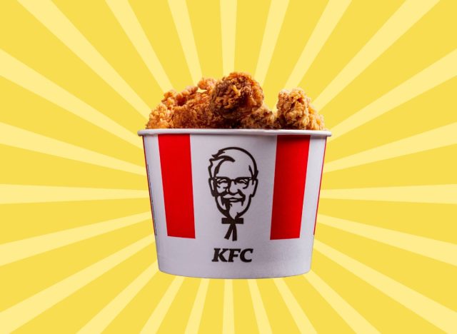 a bucket of Kentucky Fried Chicken on a designed yellow background