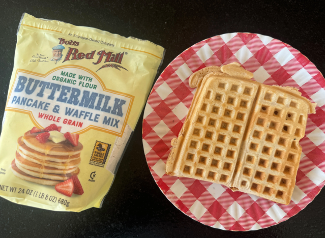 bobs red mill mix next to a waffle on a plate 
