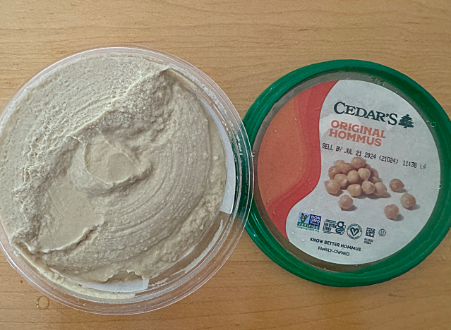 cedars hummus container open on a table 