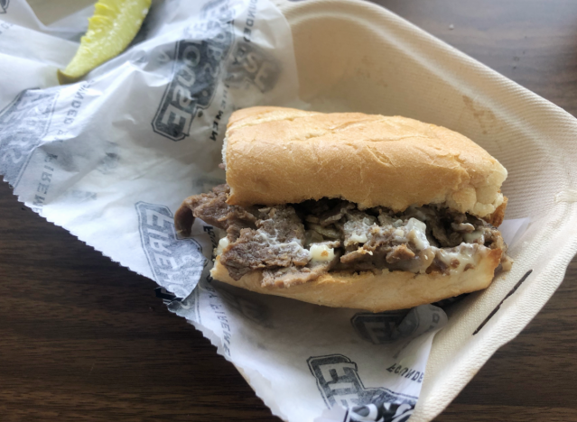 firehouse subs cheesesteak in takeout container