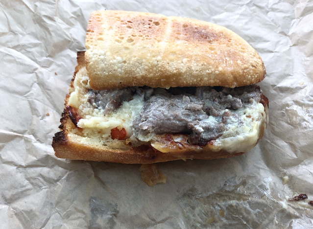 panera cheesesteak on a wrapper 