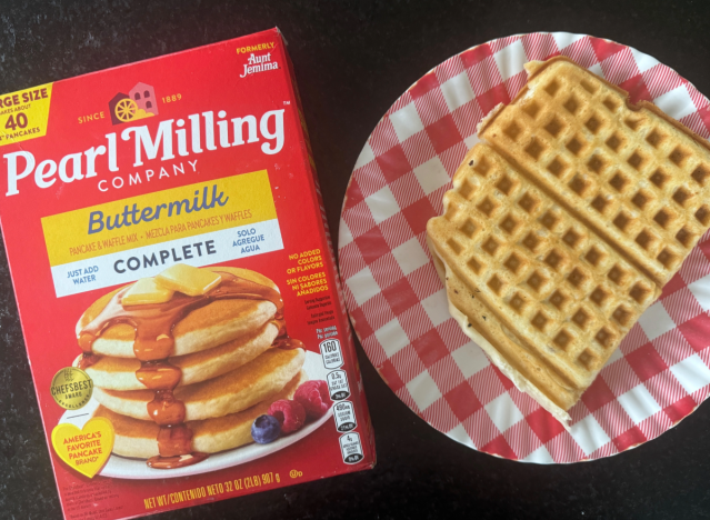 pearl milling pancake mix next to a waffle on a plate 