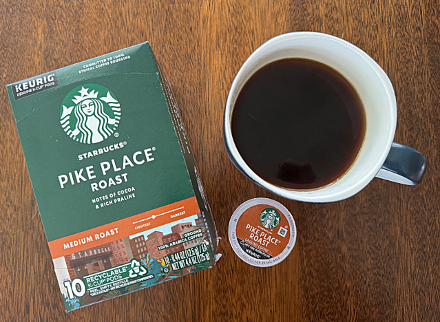 pikes place coffee box next to a mug of coffee 