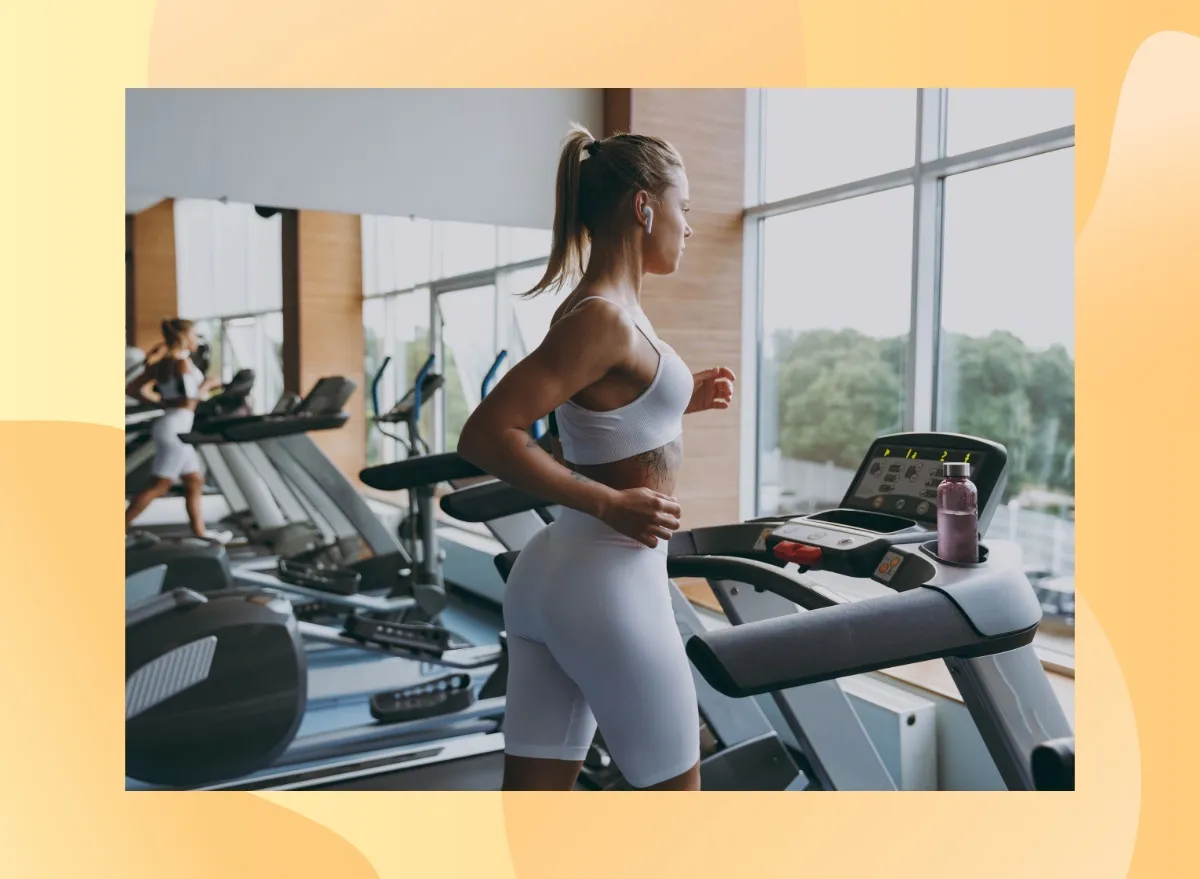 fit woman running on treadmill at the gym