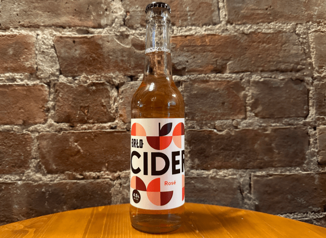 brlo rose cider in a bottle on a table