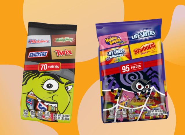 Two variety packs of Halloween-themed candies from Kroger, set against a vibrant orange background