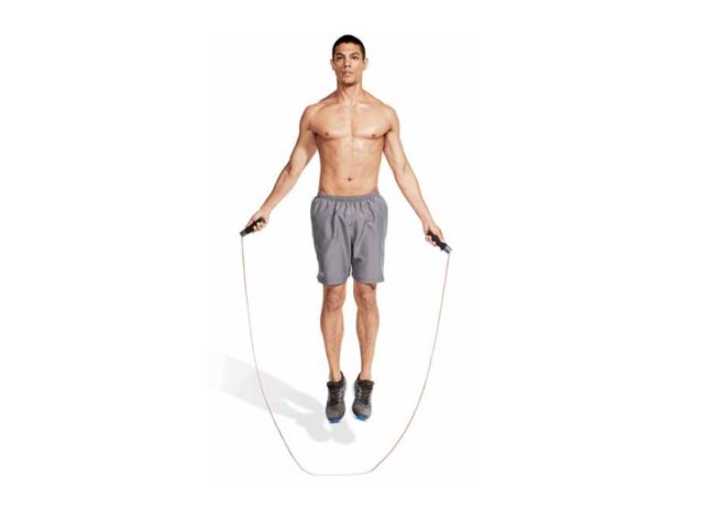 fit, muscular man jumping rope
