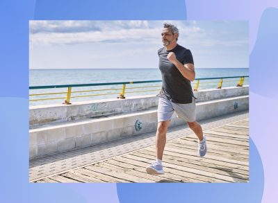 mature man running on the boardwalk on a sunny day