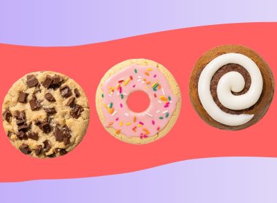 Three Crumbl cookies set against a colorful background