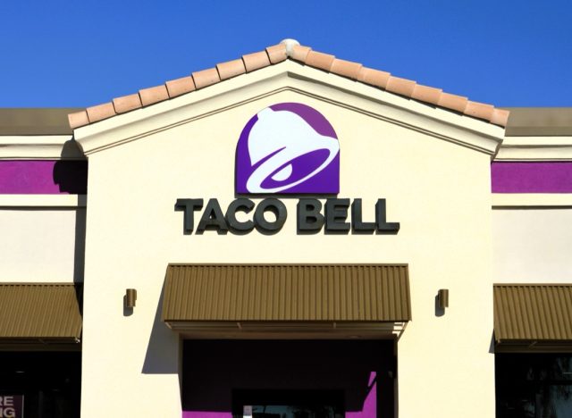 Chandler, arizona - Nov. 21 2023: Exterior of a modern Taco Bell store with sign. Charter Foods is a YUM Brands franchisee that operates Taco Bell and other fast-food restaurants in the U.S.