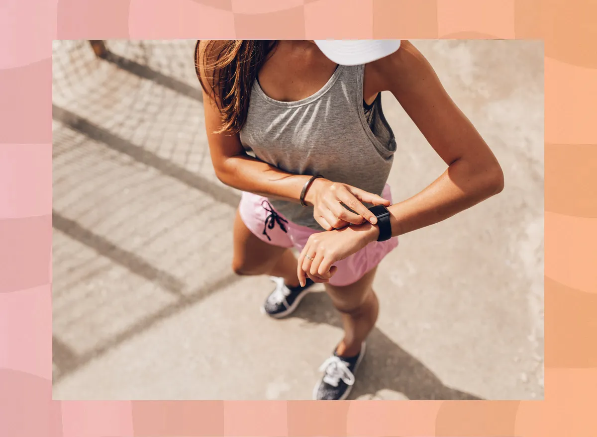 Woman using fitness tracker