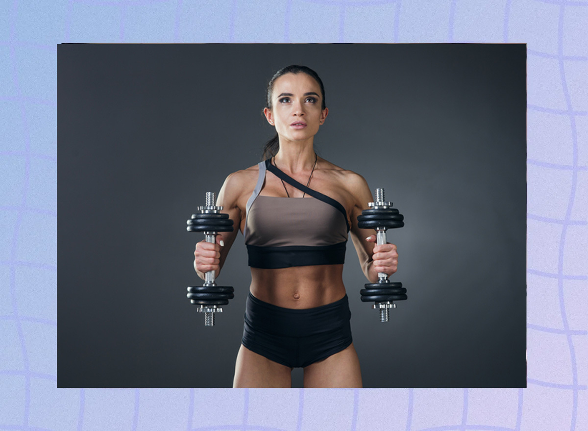 Woman with dumbels