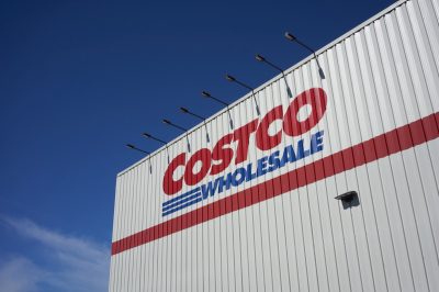 Tigard, OR, USA - Jun 23, 2020: The sign of Costco Wholesale seen at a Costco Wholesale store in Tigard, Oregon.