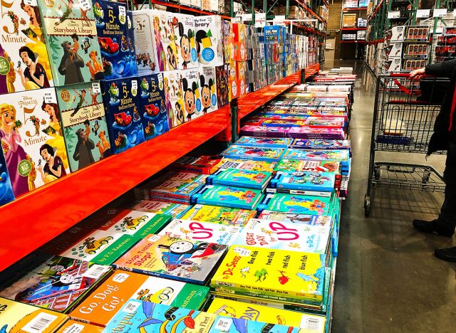 Store display of childrens books in a Costco store. Costco is an American multinational corporation which operates a chain of membership-only warehouse clubs.