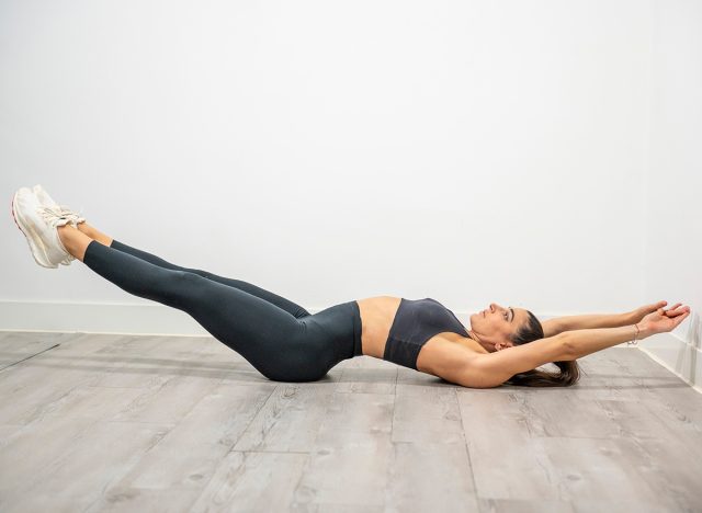 Hollow body hold exercise to strengthen core muscles, stability, and improve full-body control