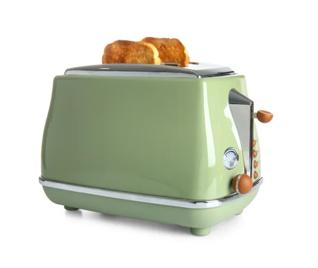 Modern toaster with crispy bread slices isolated on white background