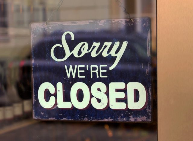 a closed shop has a sign in the schauf nests. sorry, we're closed