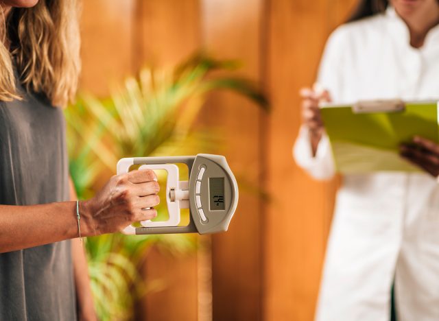 Handgrip strength test with digital hand dynamometer at a functional medicine center