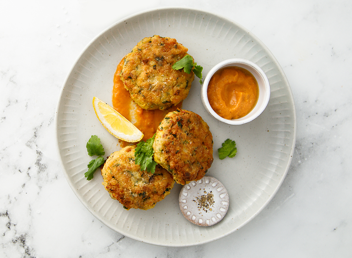Traditional homemade fish cakes with tomato sauce