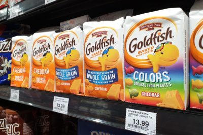 PENANG, MALAYSIA - 31 DEC 2020: Pepperidge Farm Goldfish baked snack crackers on a store shelf. Pepperidge Farm is an American commercial bakery, a subsidiary of the Campbell Soup Company.
