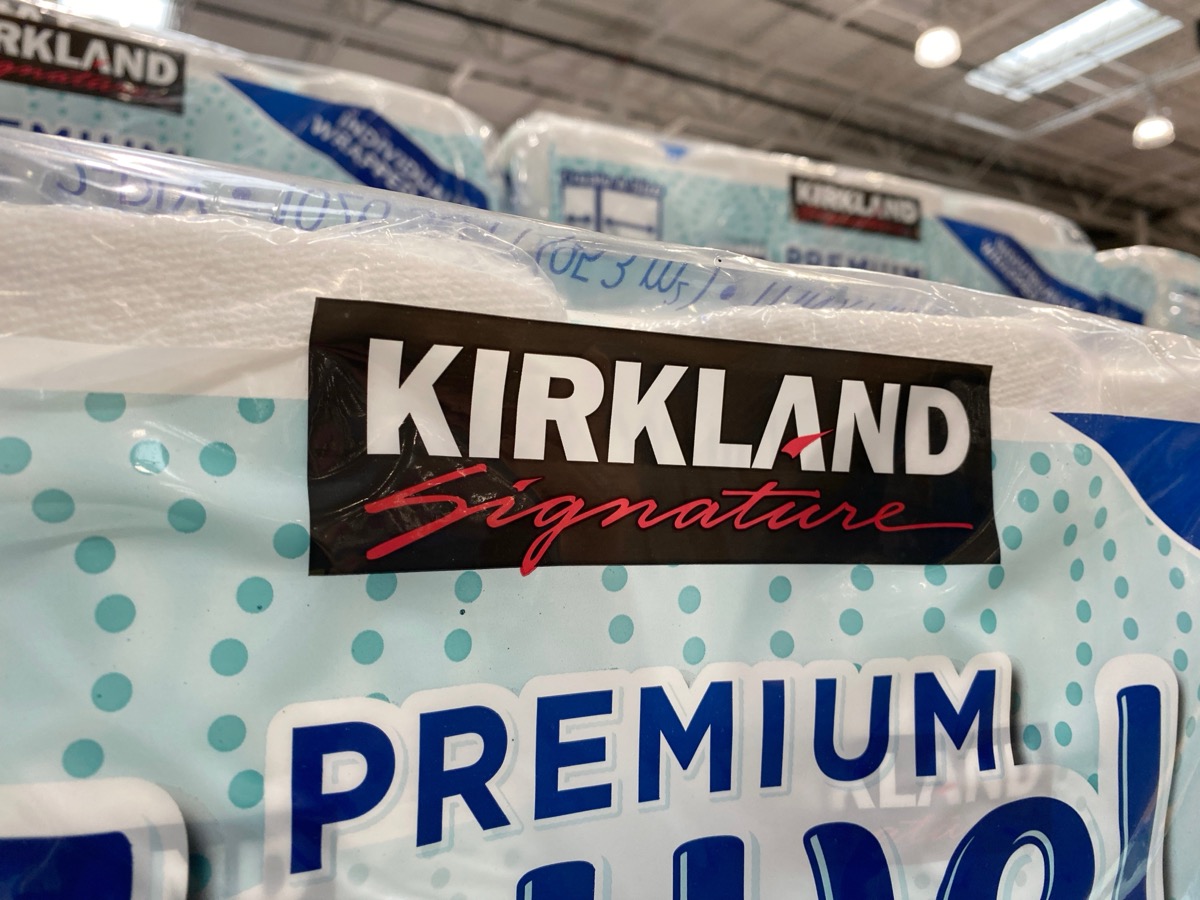 Hackensack, New Jersey - March 15, 2025: The Kirkland Signature logo on a package of paper towels at wholesale retailer Costco Business Center.