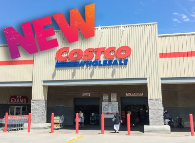 Customers enter entrance, storefront of Costco Wholesale cloud blue sky. It is the largest membership-only warehouse club in USA with total of 705 warehouses worldwide
