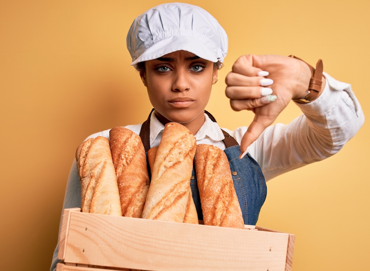 Young,African,American,Baker,Girl,Wearing,Apron,Holding,Wooden,Box